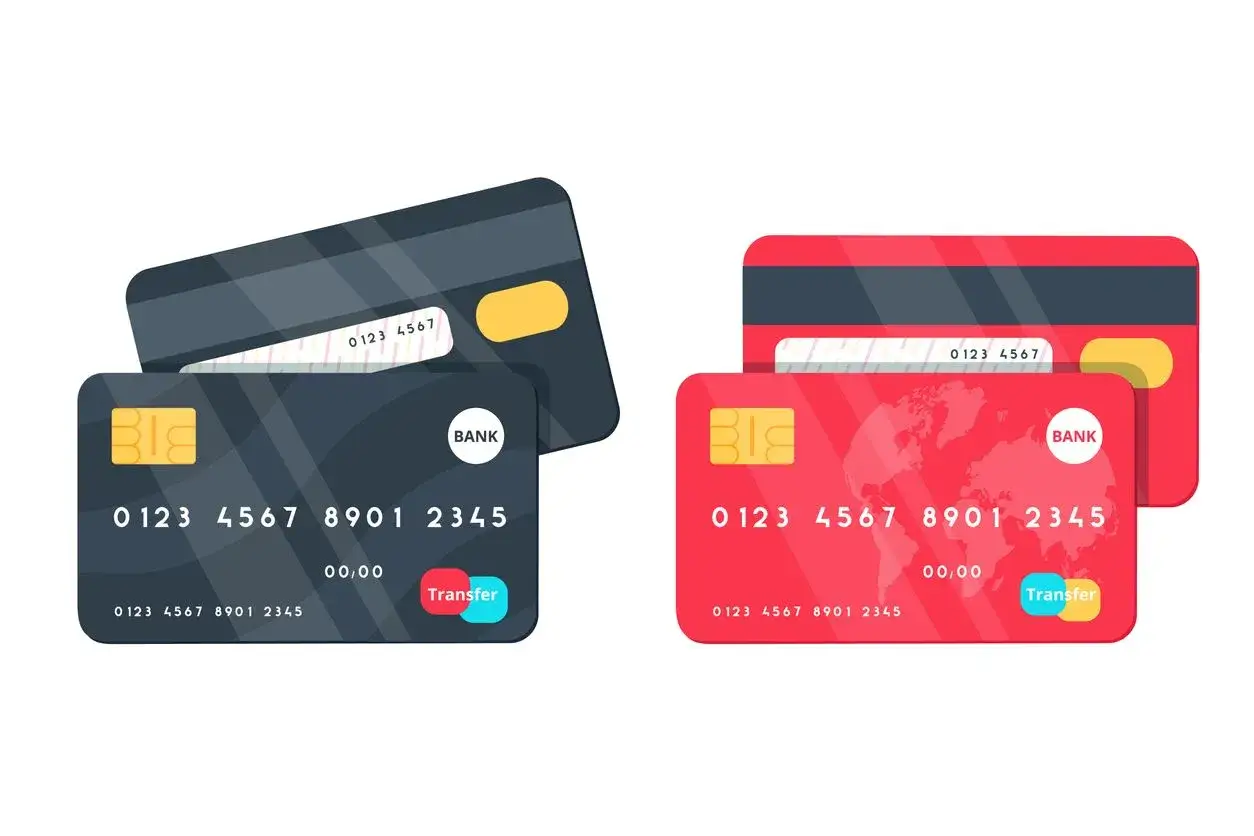 Dos tarjetas bancarias, una gris y otra roja, listas para realizar una transferencia.