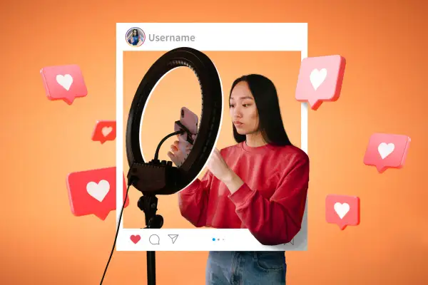 Joven influencer emprendedora graba contenido con aro de luz. Corazones flotantes celebran su éxito en redes.
